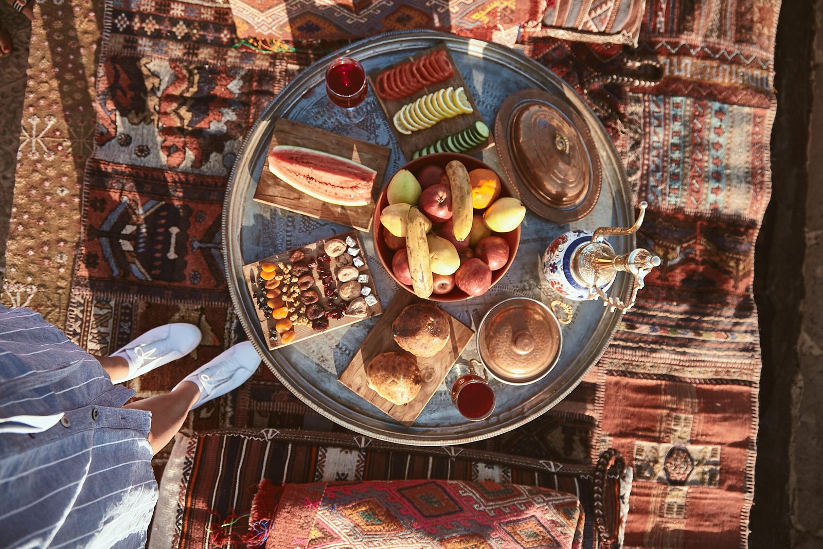 Top view of traditional turkish hotel breakfast with fruits and vegetables in Cappadocia, Turkey. Travelling, vacation, travel blog concept. Horizontal shot